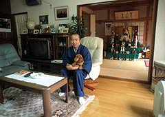 Buddhist priest in his home, Japan